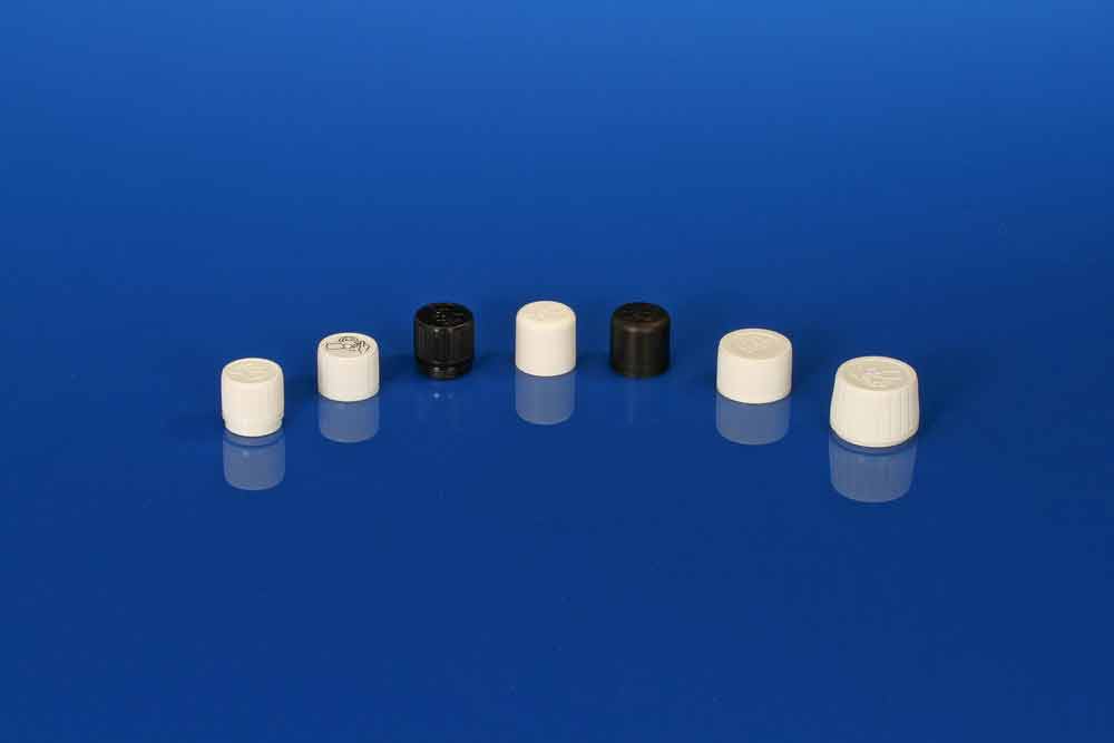 https://www.pharmaglass.com/wp-content/uploads/2014/12/Bouchons-avec-se%CC%81curite%CC%81-enfant.jpg Capsules, caps, with child safety locks